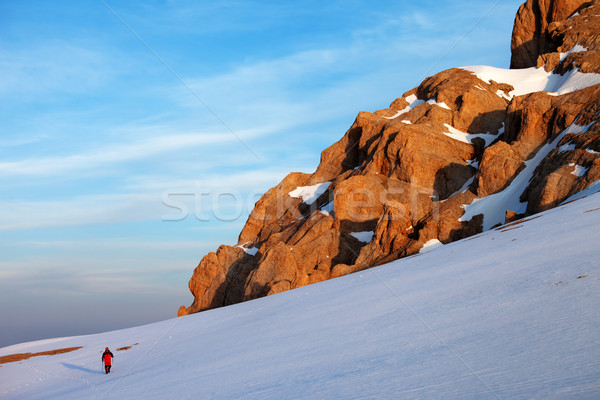 Hiker at sunrise mountains Stock photo © BSANI