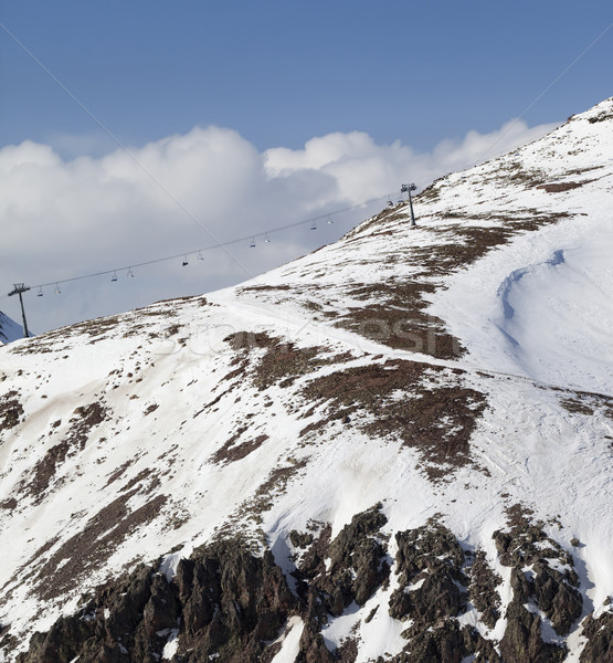 Off-piste slope with stones and chair-lift in little snow year Stock photo © BSANI