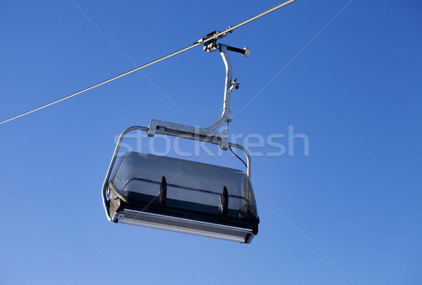 Chair-lift and blue sky Stock photo © BSANI