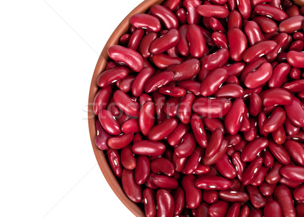 Red haricot in ceramic bowl. Top view. Stock photo © BSANI
