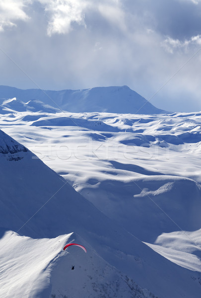Speed flying in winter evening mountains Stock photo © BSANI