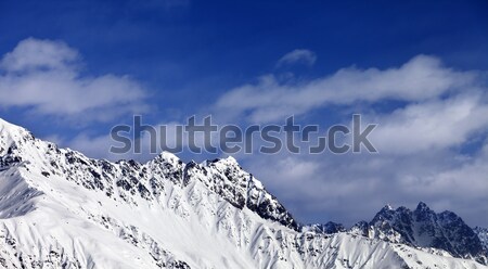 Stock photo: Panoramic view on snowy mountains at sun day