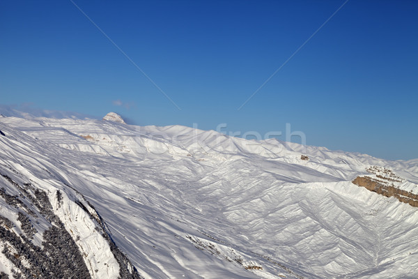 Winter snowy mountains at nice sun day Stock photo © BSANI