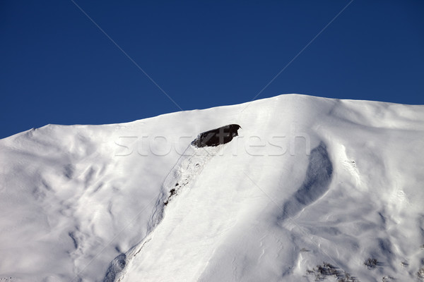 Trace of avalanche on off-piste slope in sunny day Stock photo © BSANI