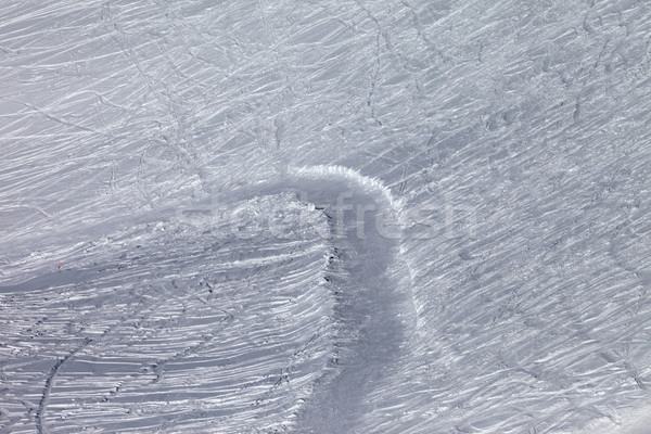 Off-piste slope and snowy road with trace from ski and snowboard Stock photo © BSANI