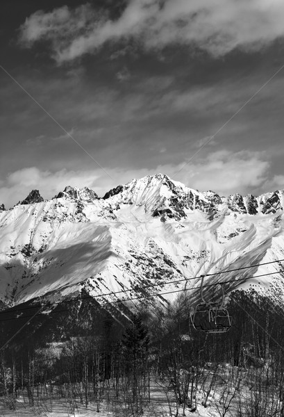 Black and white ski lift in snow mountains at nice winter day Stock photo © BSANI