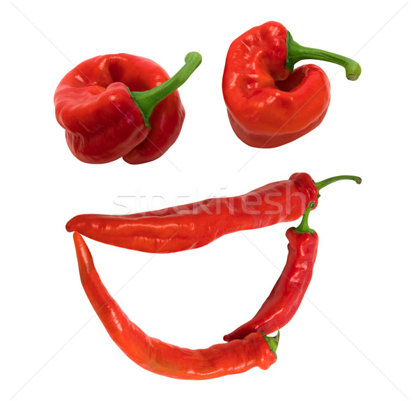 Sorriso grin rosso peperoncino isolato bianco Foto d'archivio © BSANI