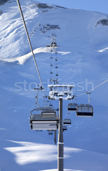 Chair-lift at early morning after snowfall Stock photo © BSANI