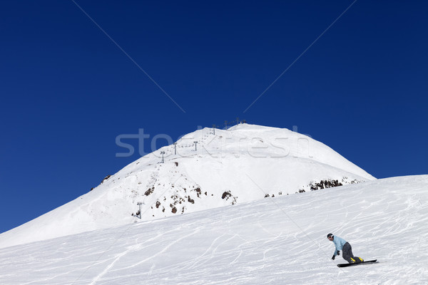 Snowboarder at the ski resort in nice day Stock photo © BSANI