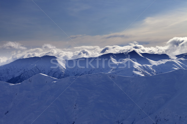 Iarnă munţi lumina soarelui nori caucaz Imagine de stoc © BSANI
