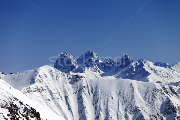 Stock photo: Snowy rocks at nice sun day