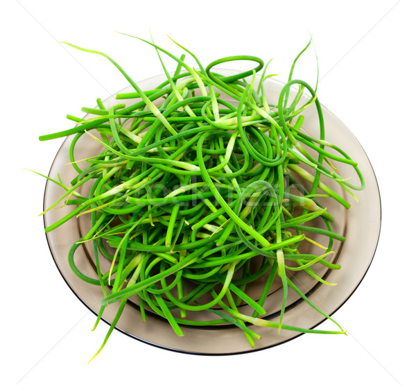 Fresh garlic scapes on plate Stock photo © BSANI