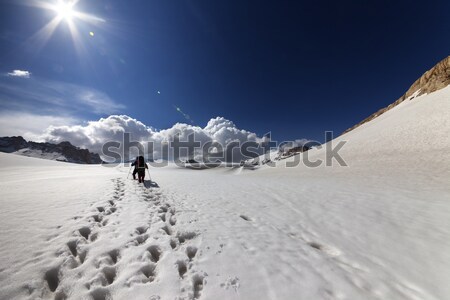 Two hikers on snow plateau. Stock photo © BSANI