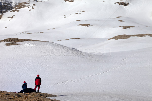 Two hikers on halt in snowy mountain Stock photo © BSANI