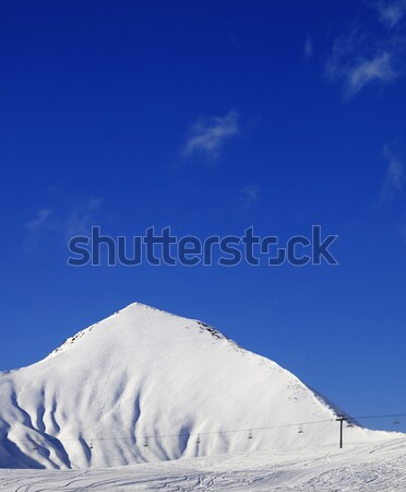 Ski slope with ropeway at sun winter day Stock photo © BSANI