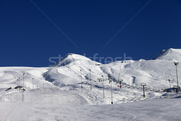 Stock photo: Winter mountains and ski slope at sun day