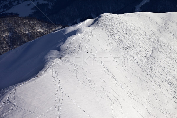 Top view on off piste slope with snowboarders and skiers in even Stock photo © BSANI