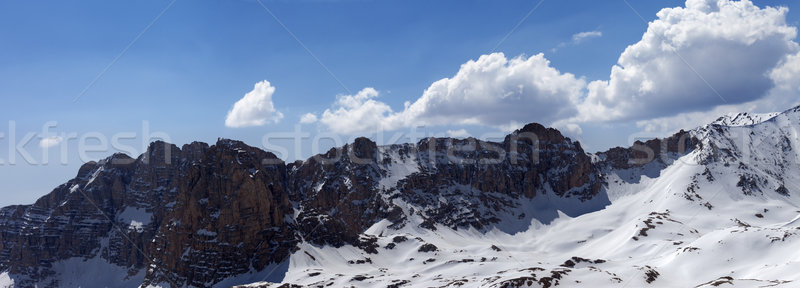 Panorama of snowy mountains in spring sunny day Stock photo © BSANI