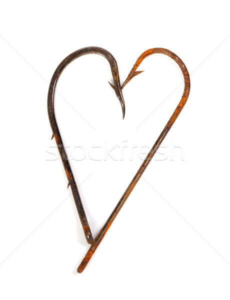 Old rusty fish hooks in form of heart Stock photo © BSANI