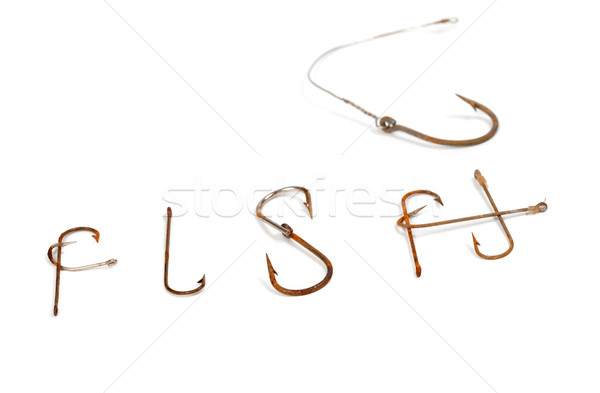Word F I S H composed of old rusty fish hooks Stock photo © BSANI