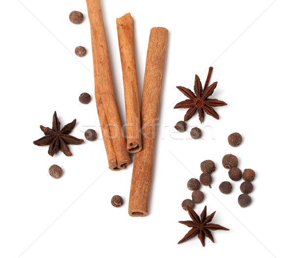 Cinnamon sticks, anise stars and black peppercorns Stock photo © BSANI