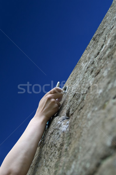 Climber's hand with quick-draws Stock photo © BSANI