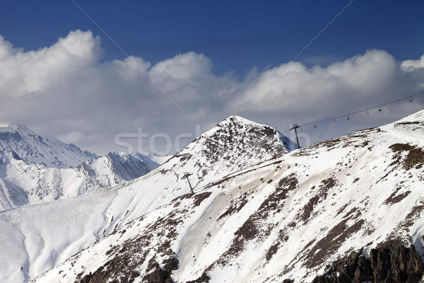 Off-piste slope and chair-lift in little snow year Stock photo © BSANI