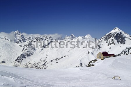 Snowmaking in ski slope at sun day Stock photo © BSANI