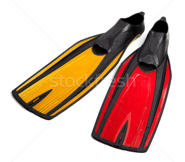 Swim fins of different colors with water drops Stock photo © BSANI