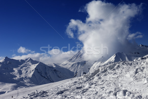 Snowdrift, ski slope and beautiful snowy mountains Stock photo © BSANI