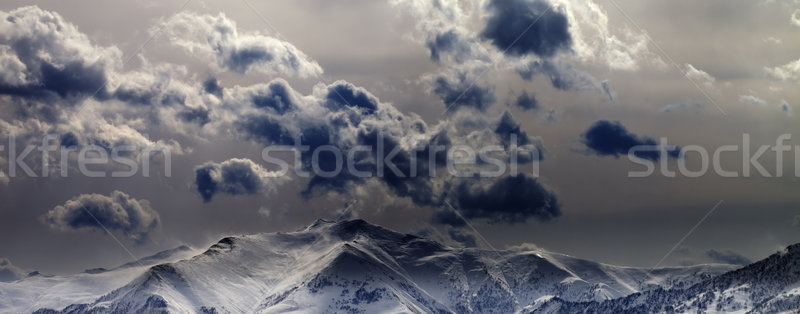 Panoramic view on evening mountains and cloudy sky Stock photo © BSANI