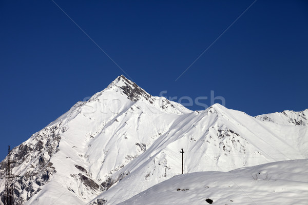 Snowy mountains and blue clear sky in nice day Stock photo © BSANI