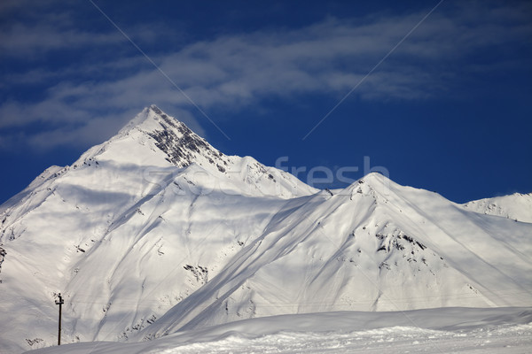 Skipiste blauer Himmel Wolken Berge Stock foto © BSANI