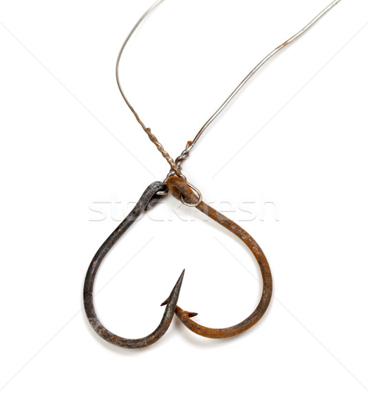 Old rusty fish hooks in form of heart Stock photo © BSANI