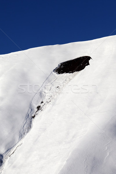 Trace of avalanche on off piste slope in sun day. Close-up view. Stock photo © BSANI