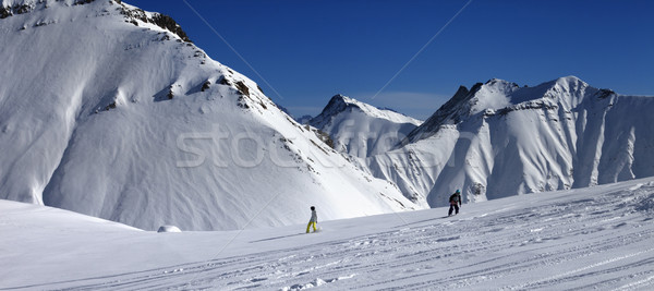 Panoramic view of snowboarders downhill on off piste slope after Stock photo © BSANI