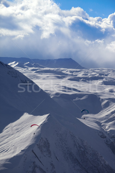 Sky gliding in snowy mountains Stock photo © BSANI