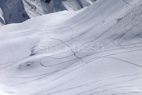 Top view on snowy off piste slope with trace from ski and snowbo Stock photo © BSANI