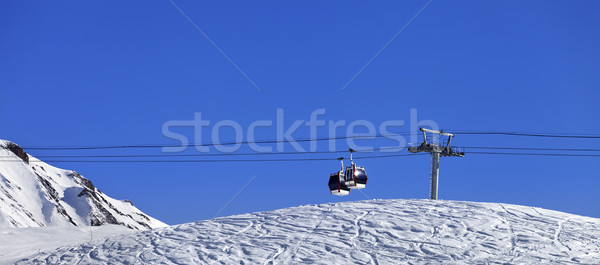 Panoramic view on gondola lift and ski slope Stock photo © BSANI