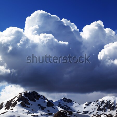 Snowy mountains and blue sky Stock photo © BSANI