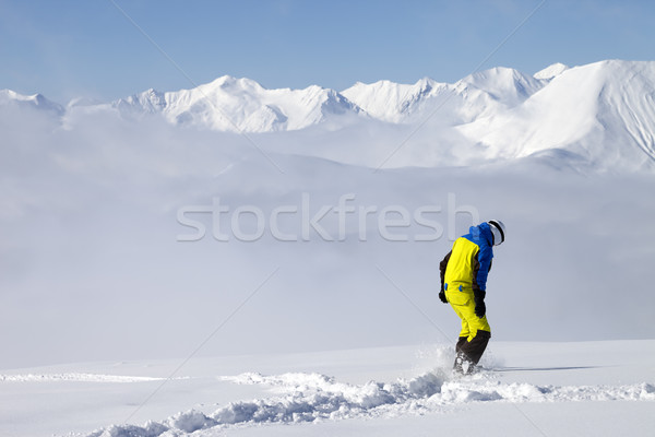 Snowboarder on off-piste slope with new fallen snow Stock photo © BSANI