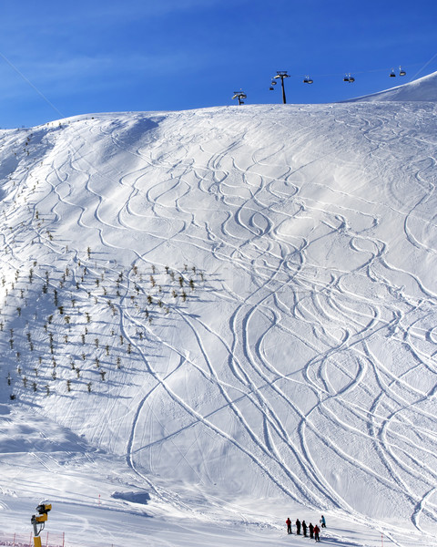 Off-piste slope with trace from ski and snowboard at sun morning Stock photo © BSANI