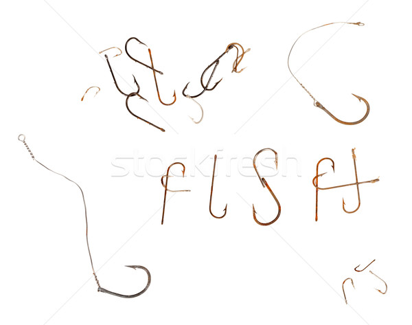 Word F I S H and old rusty fish hooks Stock photo © BSANI