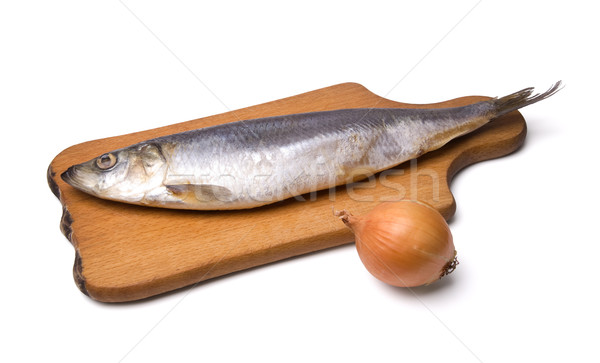 Herring with onion on kitchen board Stock photo © BSANI