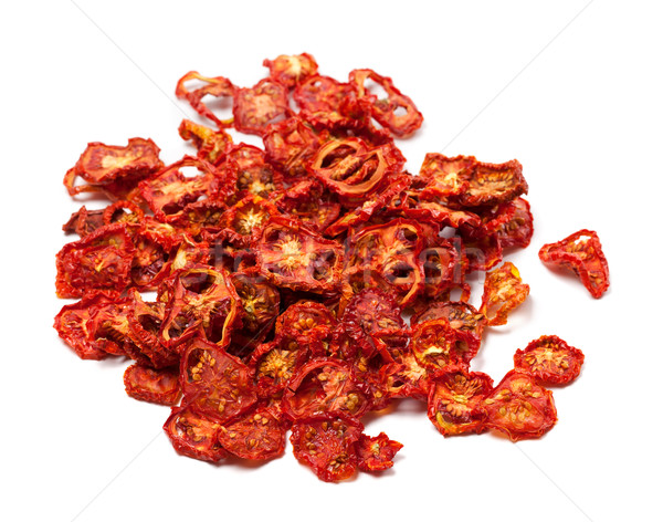 Dried slices of tomato on white background Stock photo © BSANI