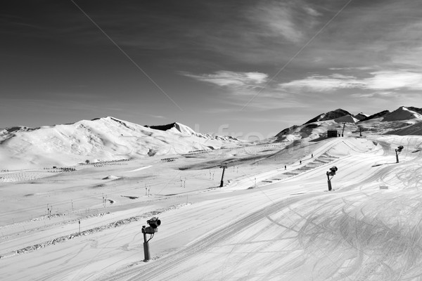Ski slope with snowmaking at sun day Stock photo © BSANI