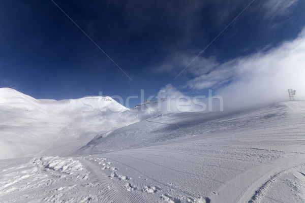 Ski slope with snowmobile trail Stock photo © BSANI