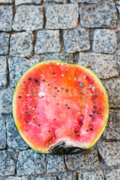 Zgniły arbuz szary kamień owoców lata Zdjęcia stock © bubutu