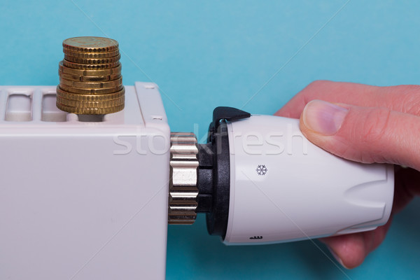 Radiátor termosztát érmék kéz kék beállítás Stock fotó © bubutu