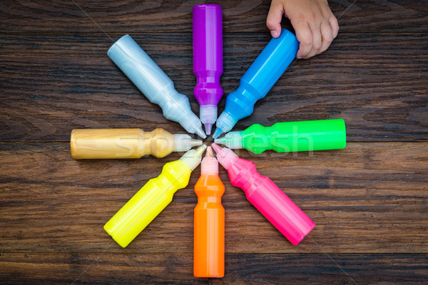 Bottles with colorful dry pigments on wooden background Stock photo © bubutu